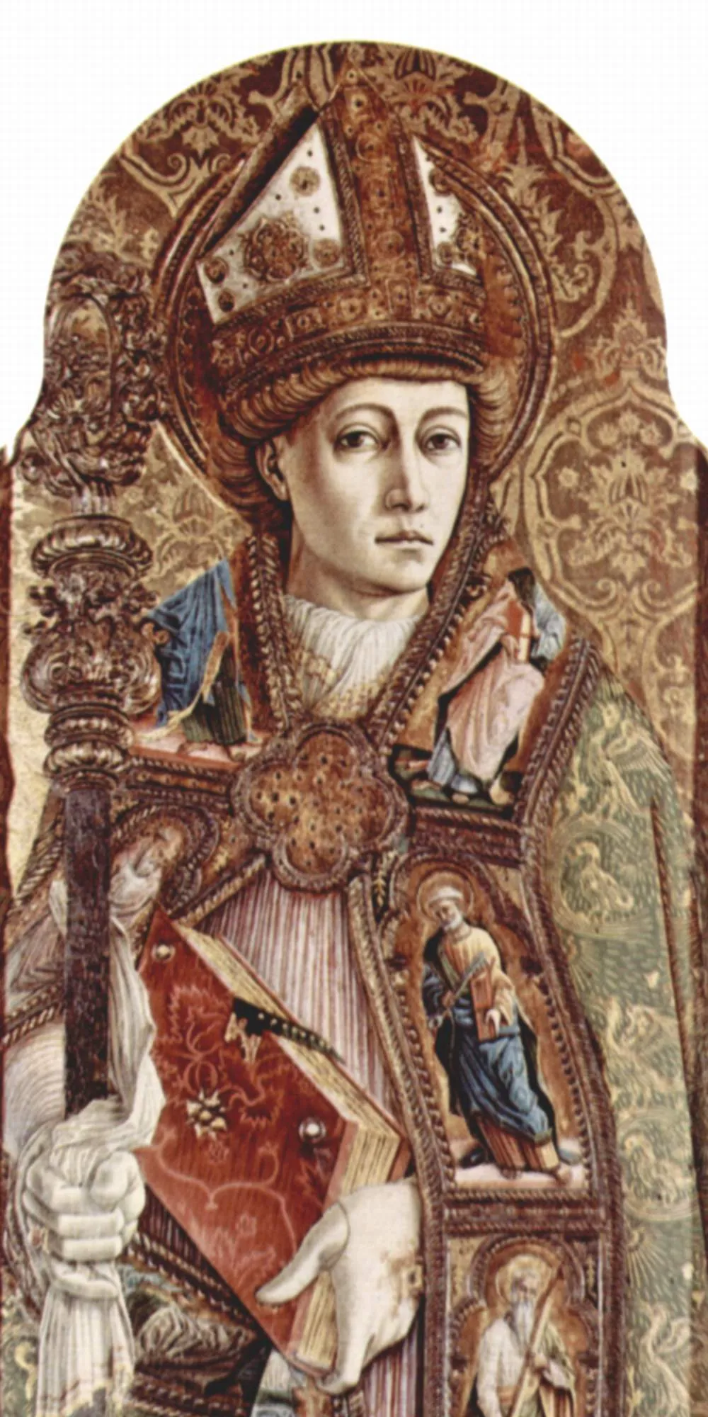 Detail of a gilded altarpiece panel showing a young beardless bishop in a tall jeweled miter and an embroidered cope decorated with small figures of saints, holding a crozier in his gloved right hand and a closed red book in his left
