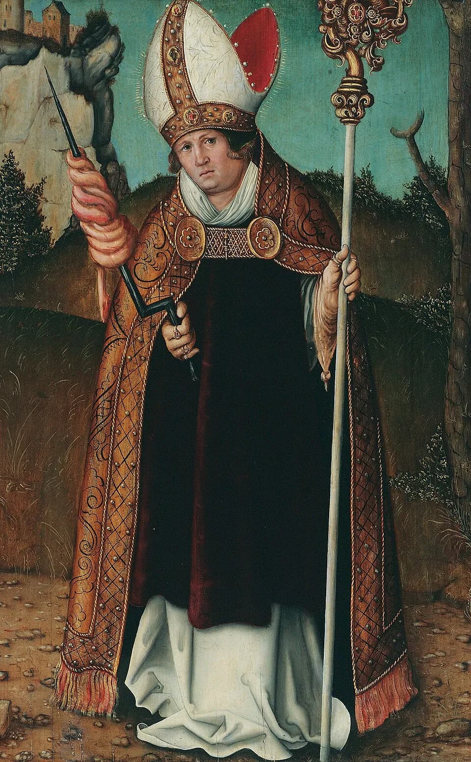 A bishop in a white miter and a brocade cope stands in a rocky landscape, holding a crozier in one hand and in the other a crank-handled windlass wound with a thick pink coil