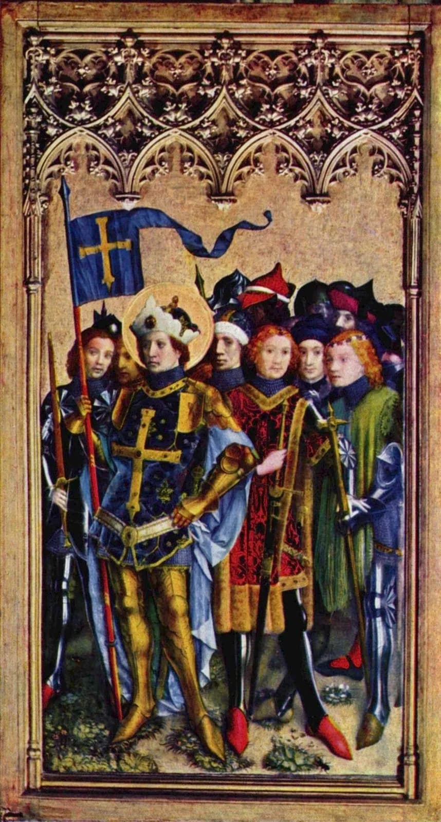 Tabla gótica: un joven santo con aureola y corona, con armadura dorada y túnica azul con una cruz de oro, que sostiene un estandarte azul con una cruz de oro, delante de un grupo de jóvenes soldados con ricas armaduras y ropas rojas y verdes, bajo un arco de tracería dorada
