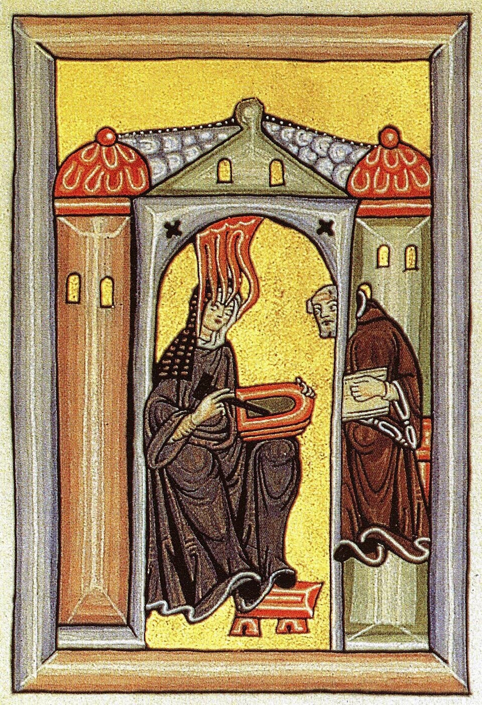 Saint Hildegard of Bingen seated with flames descending on her head, writing on a wax tablet while the monk Volmar looks in from the next room, in a medieval manuscript illumination