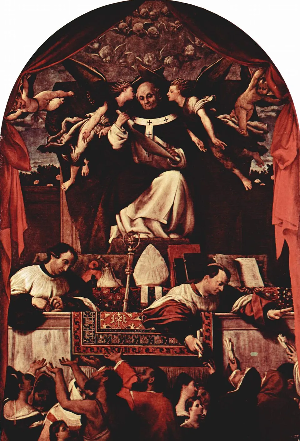 Arched altarpiece showing the saint enthroned at the top in a white Dominican habit and black cloak with a bishop's pallium, holding a scroll while two angels speak at his ears; below, two clerics at a carpet-draped balustrade take petitions and hand out alms to a crowd reaching up