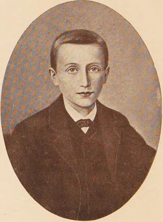 Retrato ovalado de Domingo Savio de niño, con chaqueta oscura y cuello blanco, mirando de frente