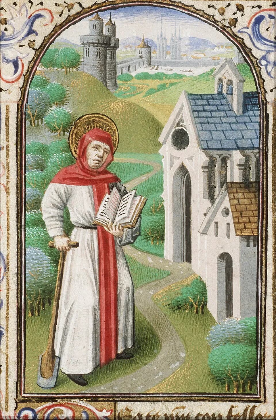 A haloed monk in a white habit and red hood stands on a winding path holding an open book in one hand and leaning on a spade with the other, beside a small chapel, with a walled town on the hills behind