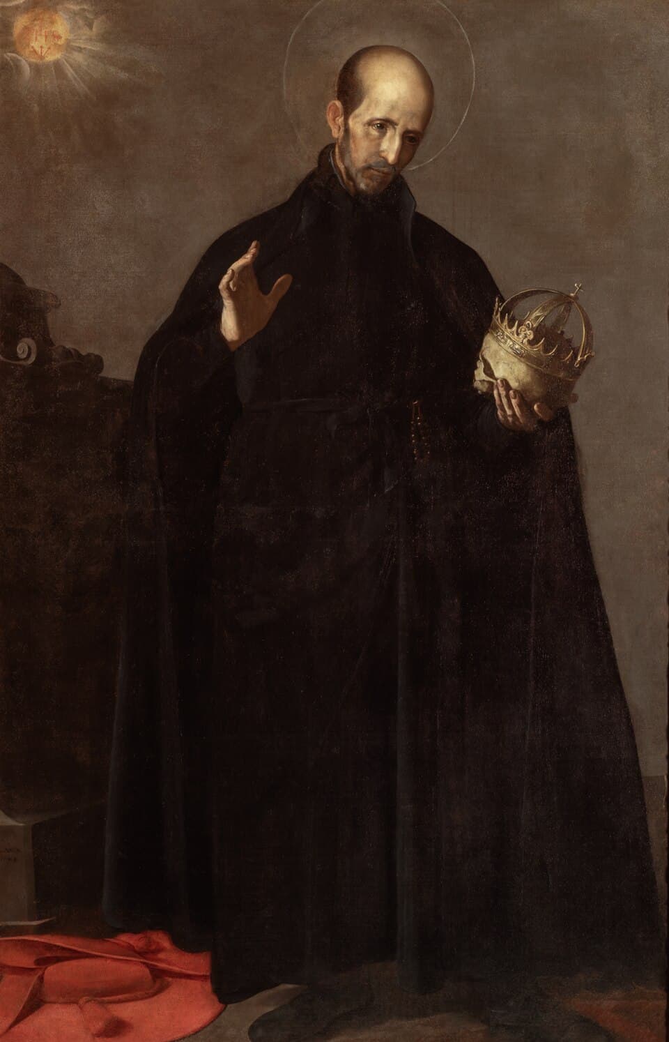 A full-length painting of Saint Francis Borgia in the black cassock and cloak of a Jesuit, holding a crowned skull in both hands, with a red ducal robe discarded on the floor behind him