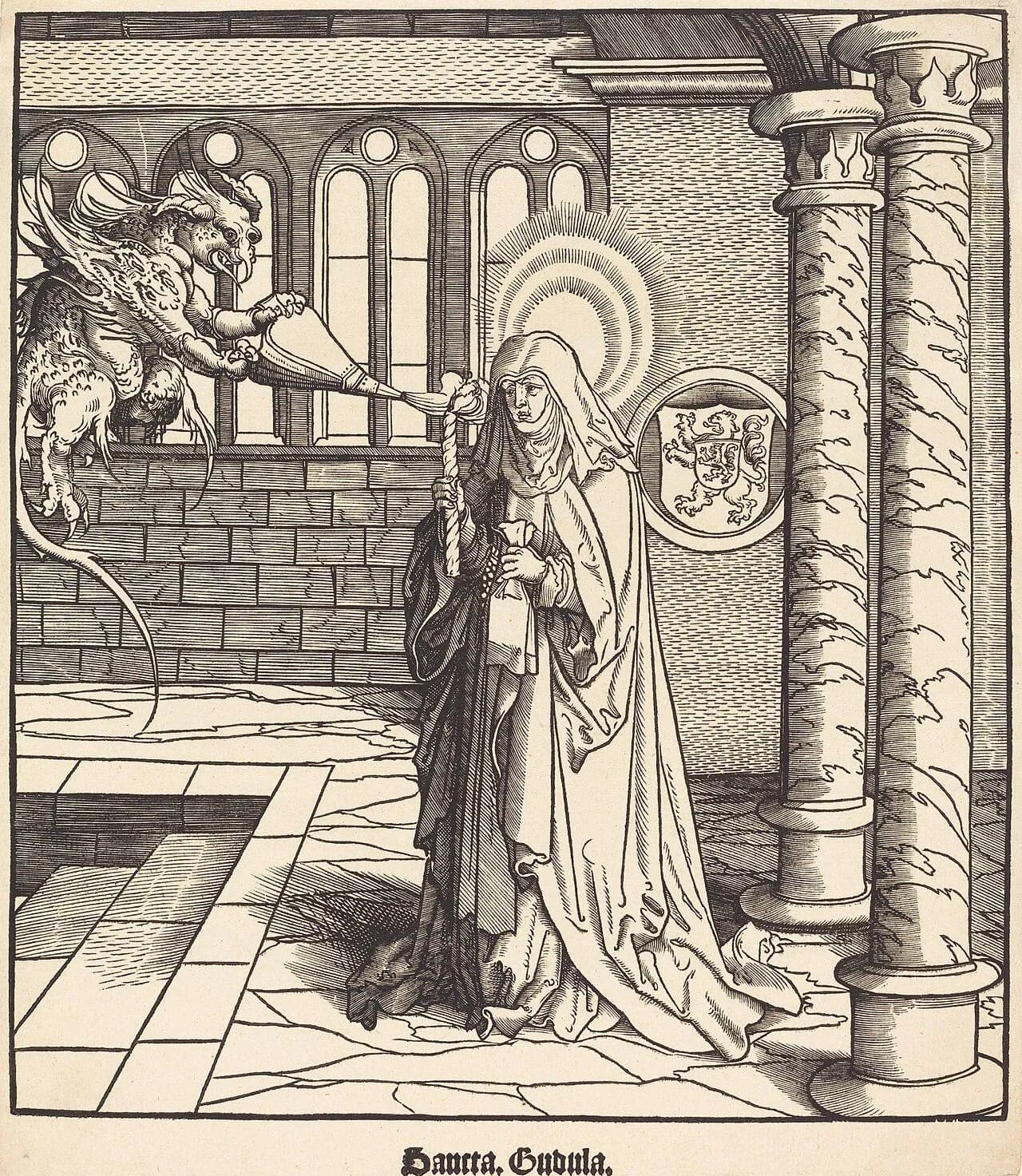 Black-and-white woodcut of a veiled woman with a radiant halo walking through a church interior with columns, holding a tall candle and a book, while a winged, horned demon perched on a wall blows at her candle with a bellows; a coat of arms with a lion hangs behind her and the caption reads Sancta Gudula