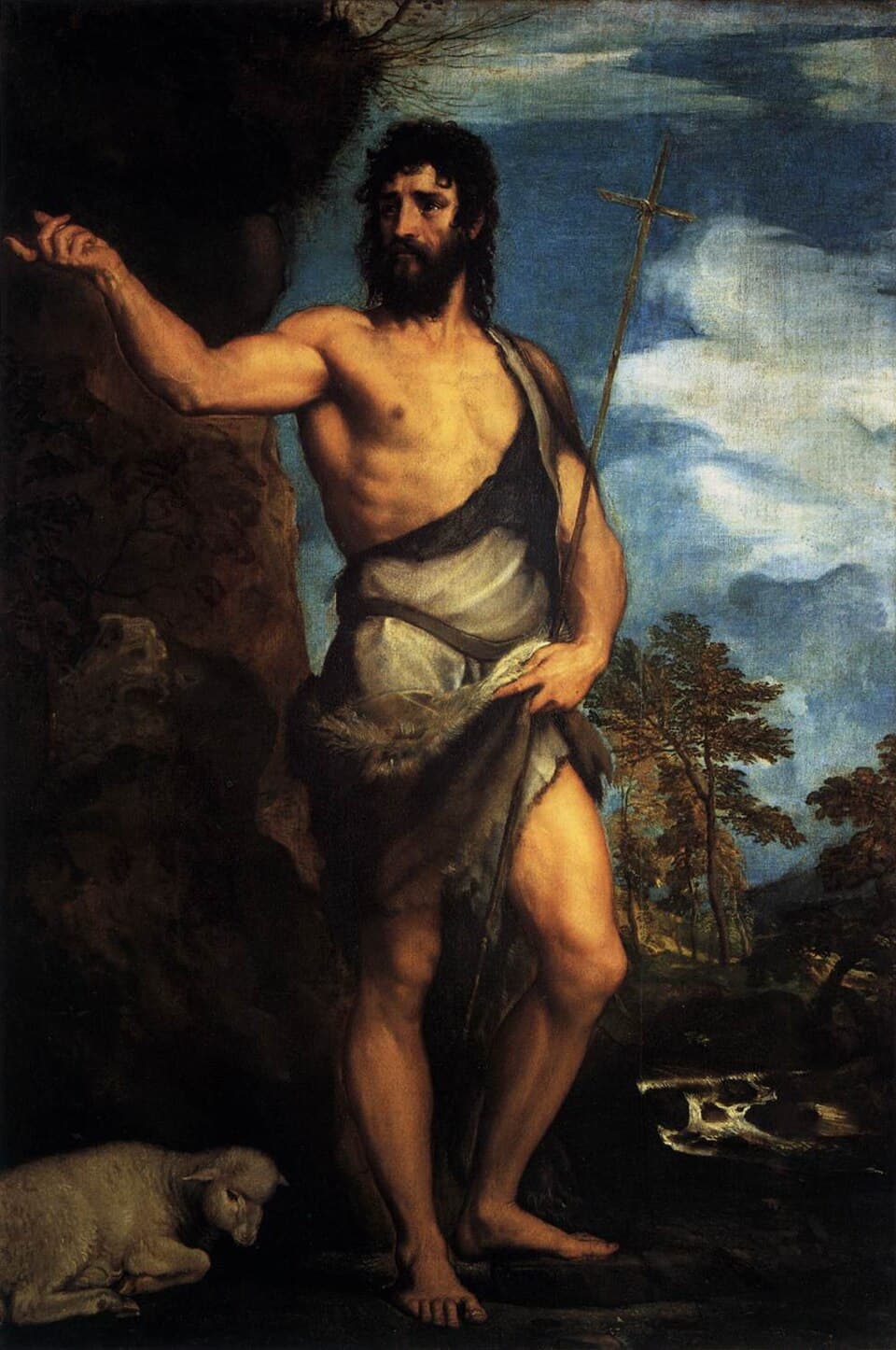 Titian's painting of John the Baptist standing barefoot in the wilderness in a camel-skin garment, holding a reed cross and pointing, with a lamb lying at his feet