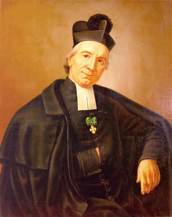 Oil portrait of Joseph Cottolengo, a smiling white-haired priest in a black biretta with a pompom, white clerical bands and a black cloak, wearing a small cross on a green ribbon