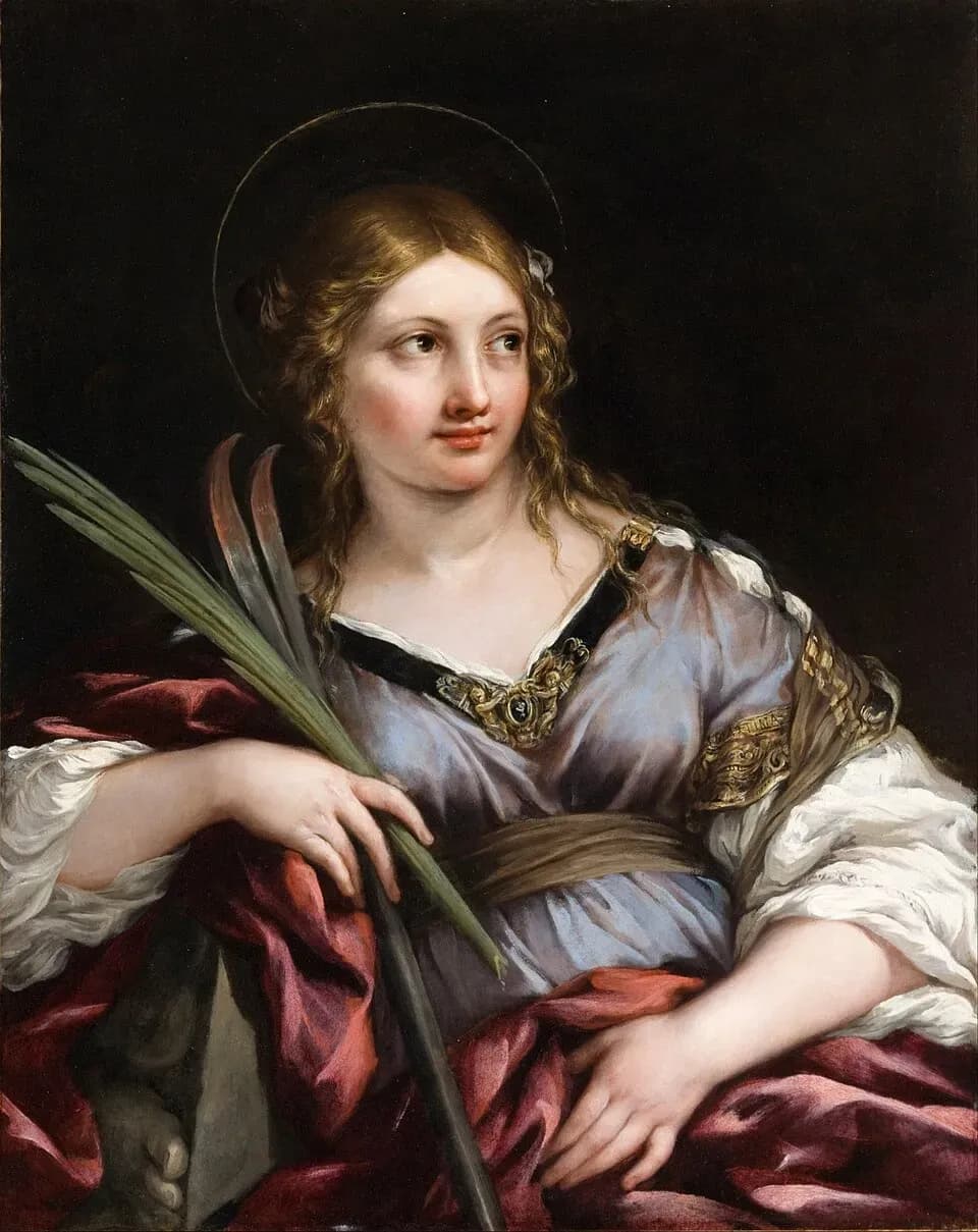 Half-length painting of a young woman with curling fair hair and a thin gold halo, in a gray-violet dress with gold embroidery and a crimson mantle, glancing to one side as she holds a green palm branch and a two-pronged iron hook against a dark background