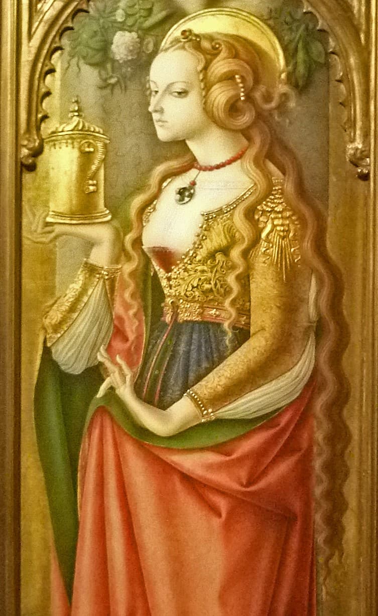 Mary Magdalene in a red robe with long fair hair, holding a gold ointment jar, painted on a gold ground by Carlo Crivelli