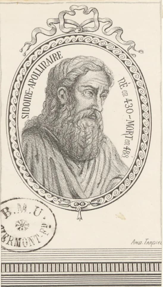 Nineteenth-century lithographed portrait of a bearded man with long wavy hair, in a draped mantle, shown in profile facing right inside an oval frame of linked scrolls tied with a ribbon bow, inscribed SIDOINE-APOLLINAIRE NÉ EN 430 - MORT EN 488, with a circular library stamp at lower left and the signature Amb. Tardieu