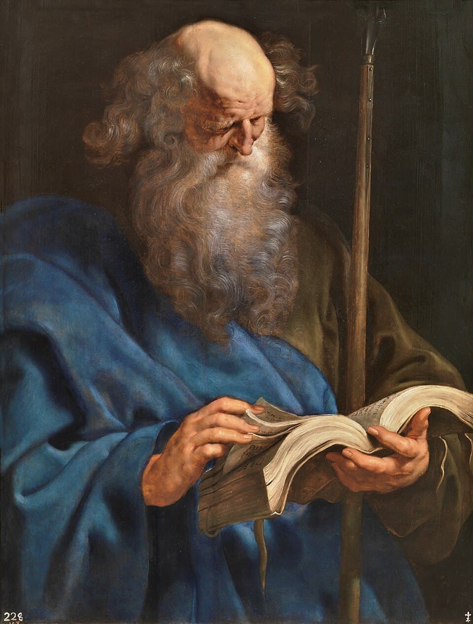 An elderly bearded apostle in a blue robe reads from a heavy open book, a spear resting against his shoulder, painted by Rubens