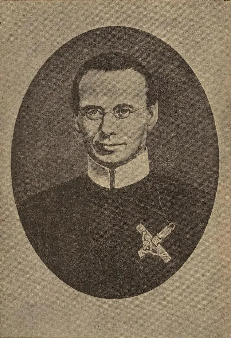 An oval portrait of Francis Xavier Seelos, a middle-aged priest with round wire-rimmed spectacles and a white standing collar, a crucifix tucked into the front of his black habit