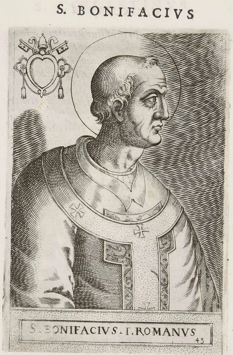 Sixteenth-century engraving of a pope with a halo shown half-length in profile facing right, bareheaded and tonsured, wearing a cope and a pallium marked with crosses, a papal coat of arms with crossed keys and a tiara in the upper corner, under the heading S. Bonifacius and above the caption S. Bonifacius I. Romanus