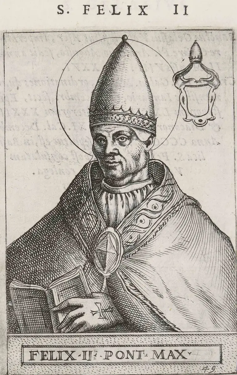 Sixteenth-century engraving of a beardless pope with a halo, shown half-length, wearing a tall conical tiara with a single crown and a cope fastened by a large oval clasp, his gloved right hand marked with a cross and resting on an open book, with an empty shield under a small tiara at upper right, under the heading S. Felix II and above the caption Felix II Pont. Max.