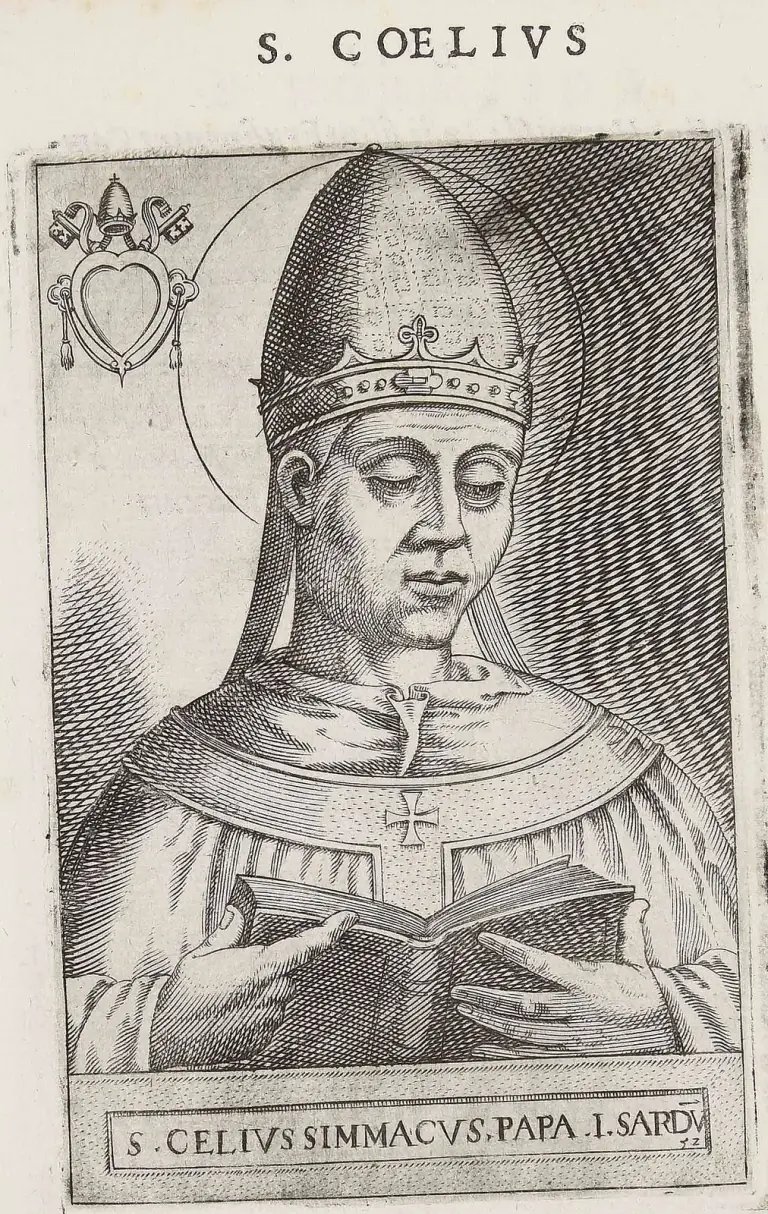 Grabado del siglo XVI de un papa sin barba, con aureola, de medio cuerpo, con la mirada baja hacia un libro abierto que sostiene con ambas manos, con una tiara alta y cónica de una sola corona y una esclavina con una pequeña cruz en el pecho, con armas papales de tiara y llaves cruzadas sobre un escudo en blanco en forma de corazón arriba a la izquierda, bajo el encabezado S. Coelius y sobre la leyenda S. Celius Simmacus Papa I Sardu