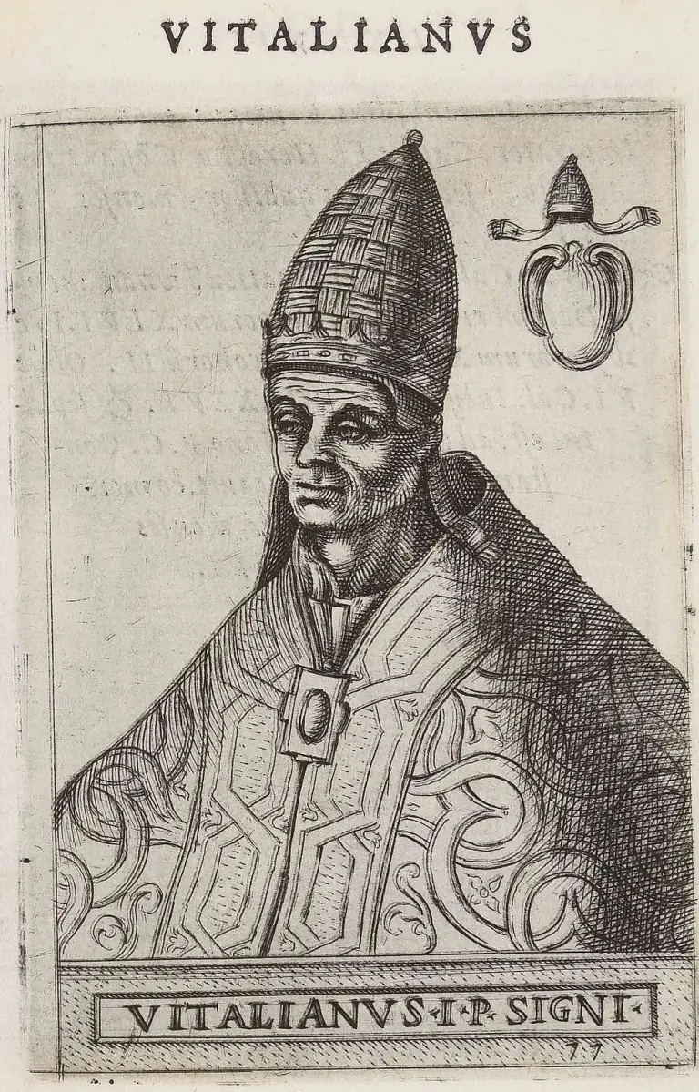 Sixteenth-century engraving of a pope shown half-length and turned slightly to the left, wearing a tall woven conical tiara with a single crown and a cope of strapwork brocade fastened by a square clasp, with a blank shield under a tiara at upper right, headed Vitalianus and captioned Vitalianus I P. Signi